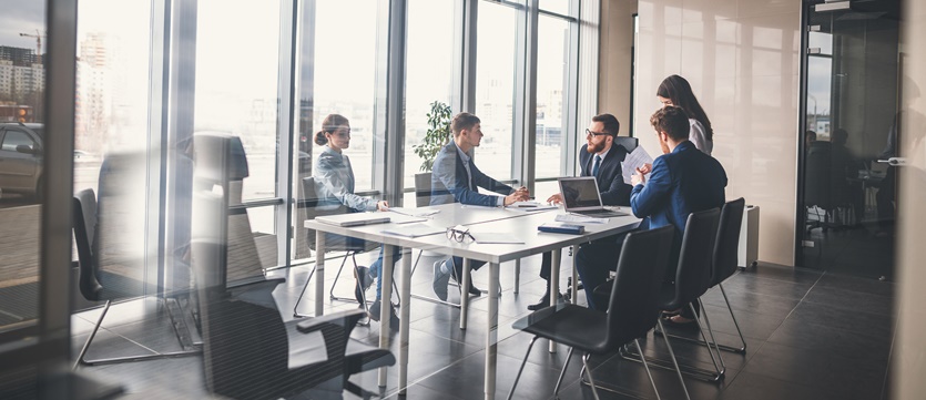 business team and manager in a meeting